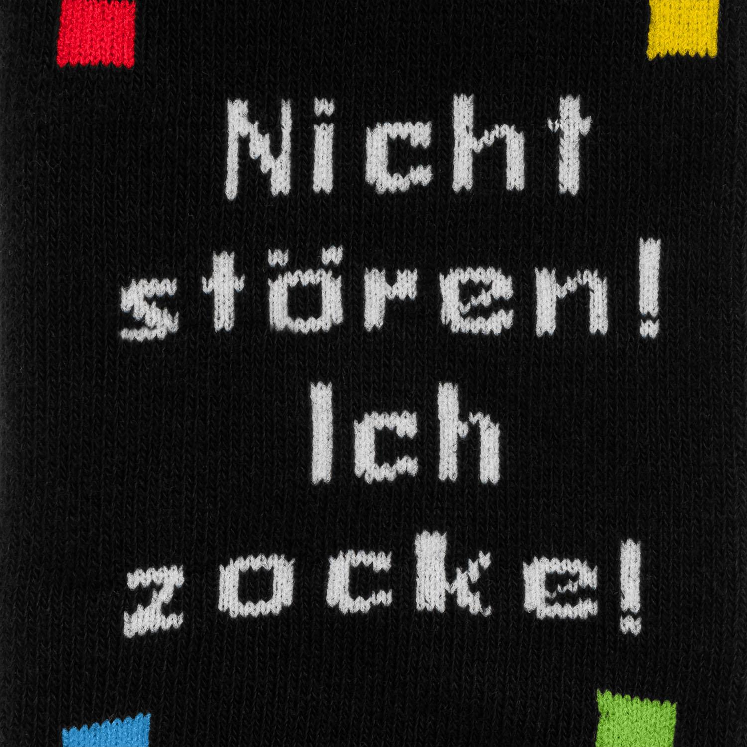 Schwarze Zaubersocke Klein »Zocken« mit weißem Gaming-Schriftzug und bunten Akzentfeldern