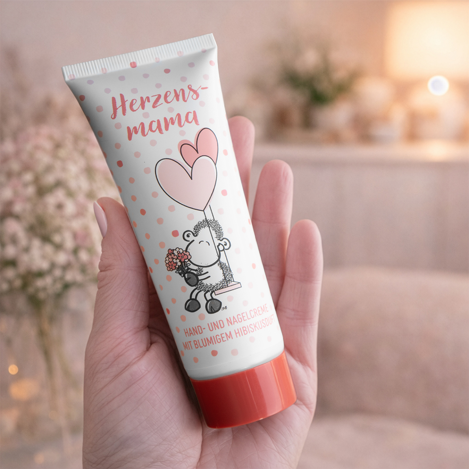 Handcreme in pastelrosa Tube mit Herzballon-Motiv
