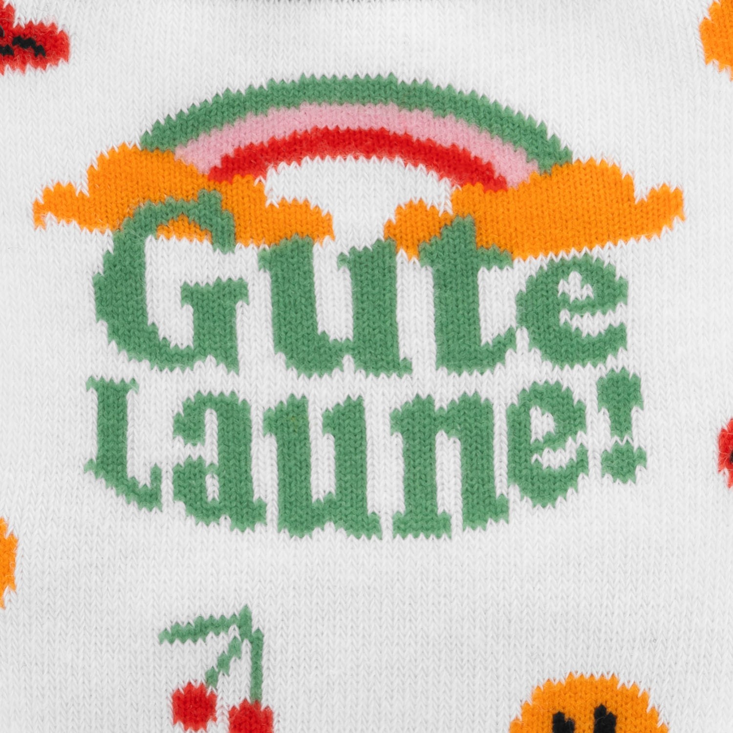 Weiße Socke mit buntem Gute-Laune-Regenbogen-Motiv