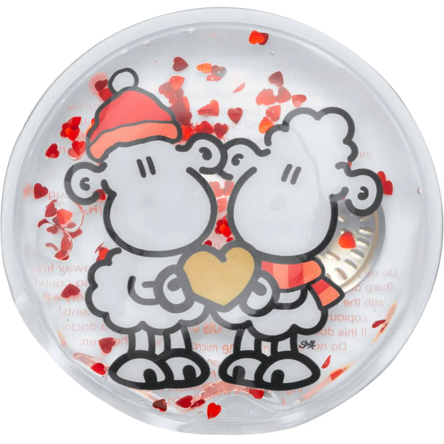 Runder Handwärmer in Geschenkbox mit zwei Schafen, die sich küssen, und roten Herzchen-Konfetti.