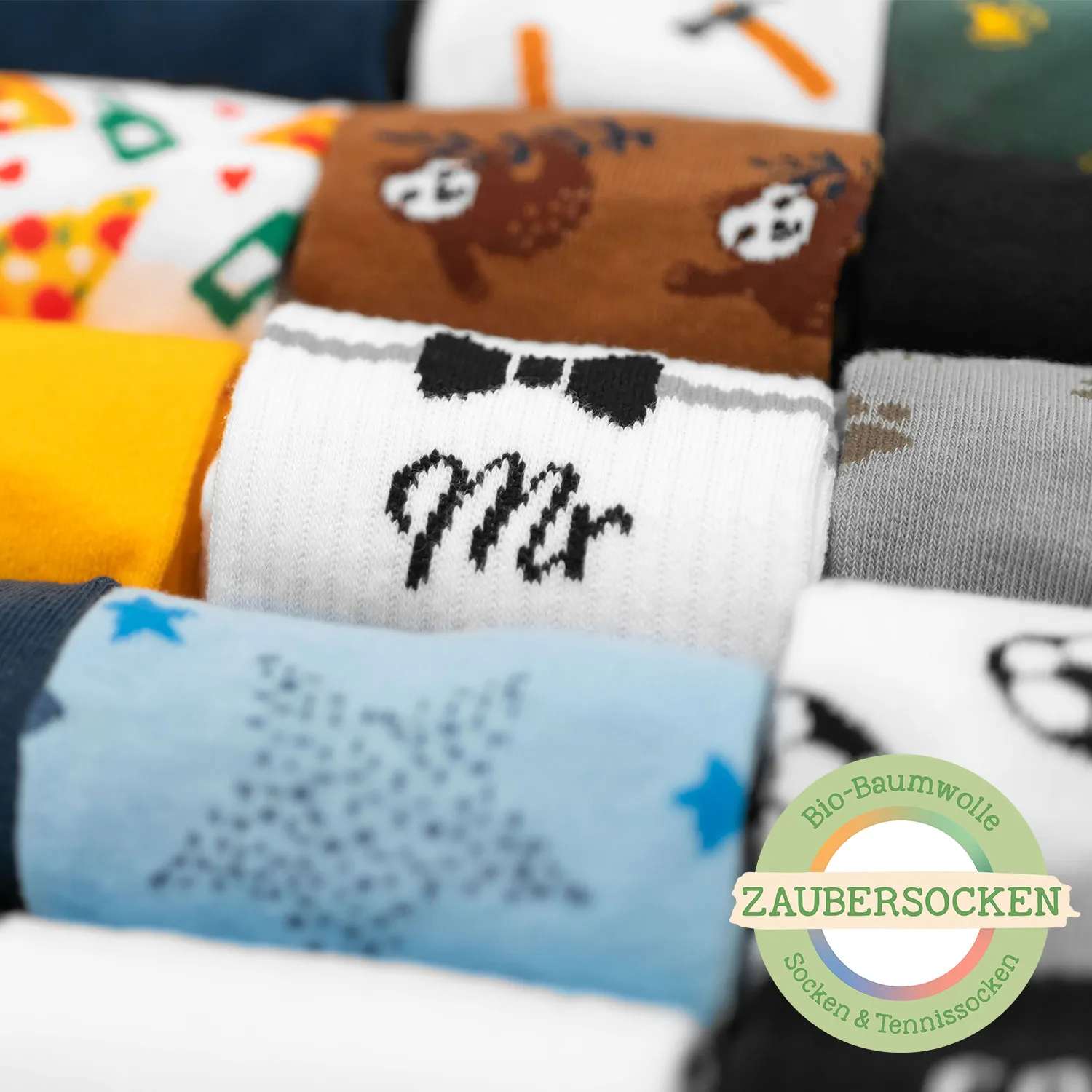 Zaubersocken Bio-Baumwolle »Bester Papa« – bunte Socken mit Tier- und Sternmotiven.