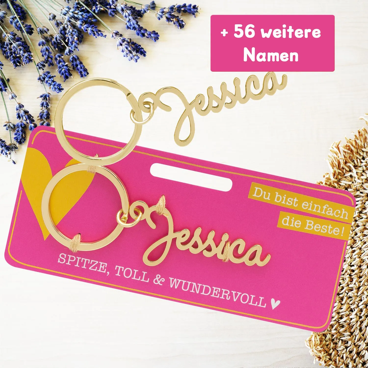 Goldfarbener Namens-Schlüsselanhänger Jessica auf pinkem Namensschild