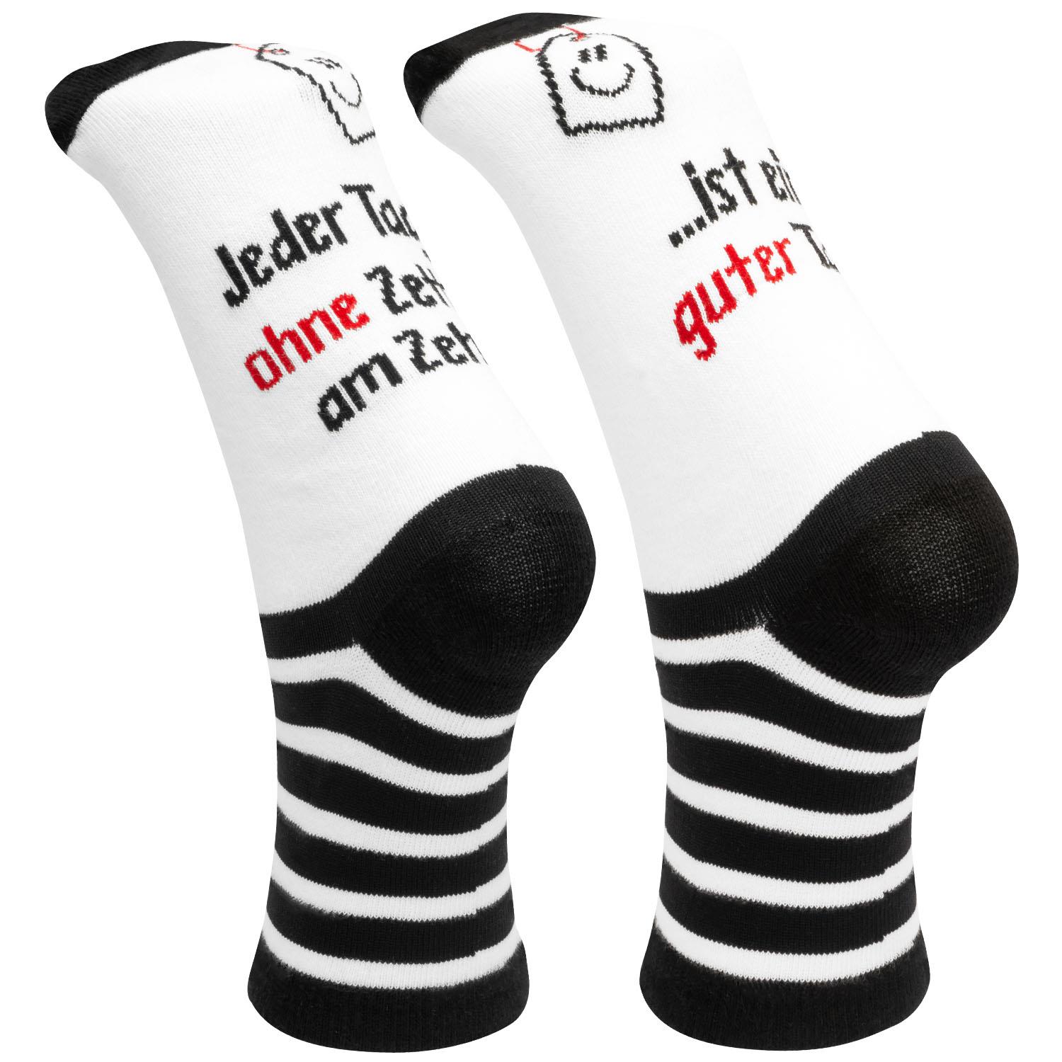 Weißes Paar Zaubersocken mit schwarzen Streifen und rotem Schriftzug