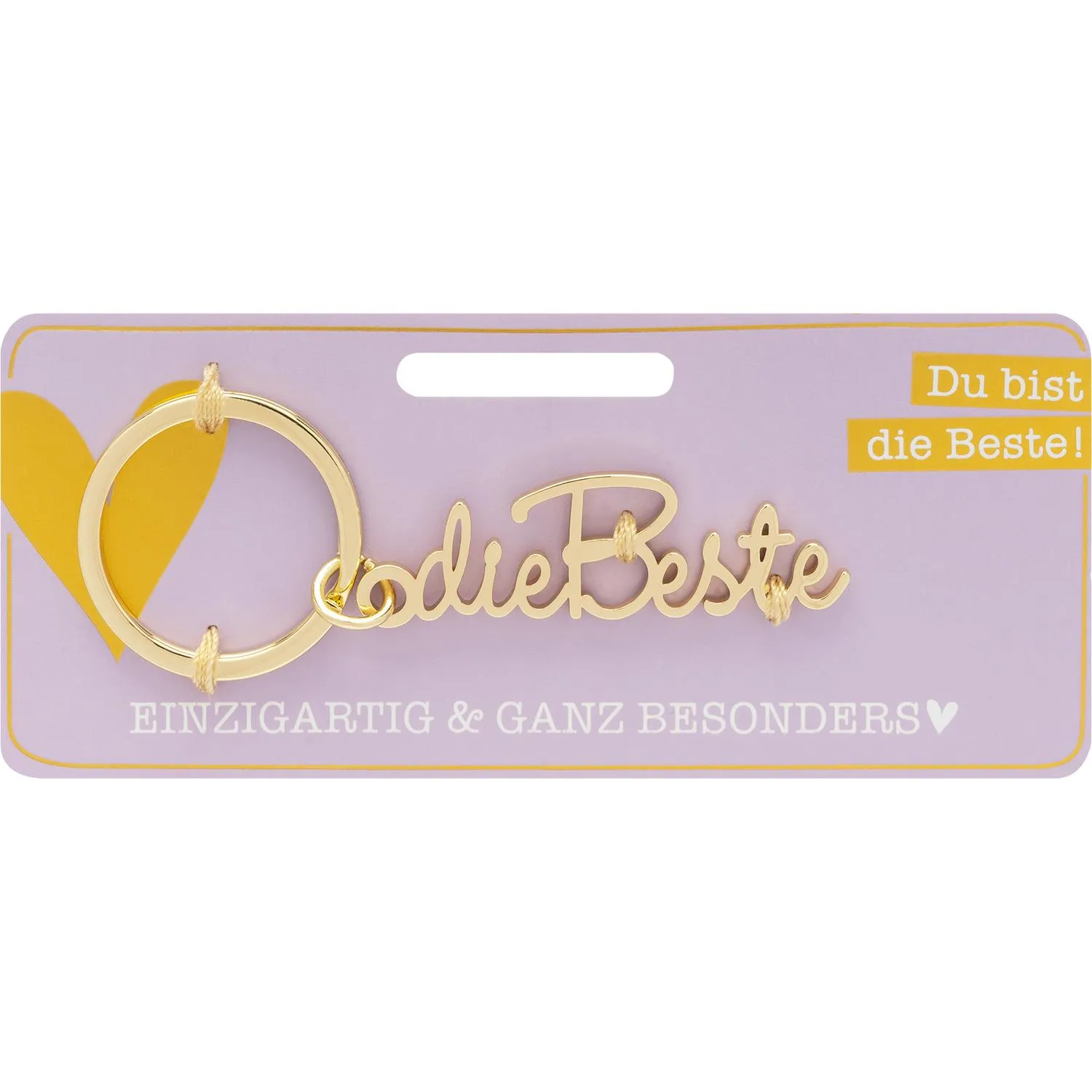 Goldener Schlüsselanhänger mit Schriftzug Die Beste auf lilafarbener Verpackung