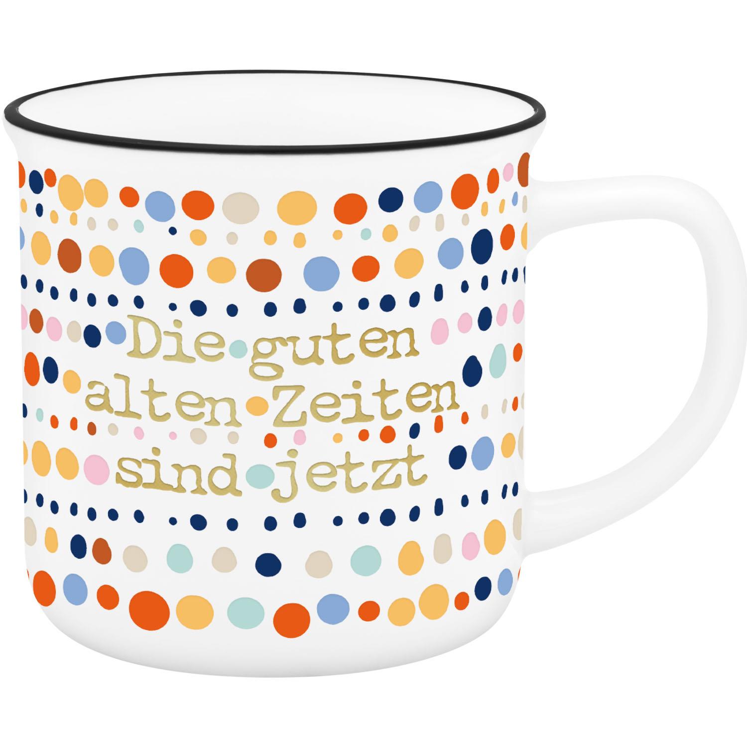 Weißer Becher mit buntem Punkte-Muster und schwarzem Rand