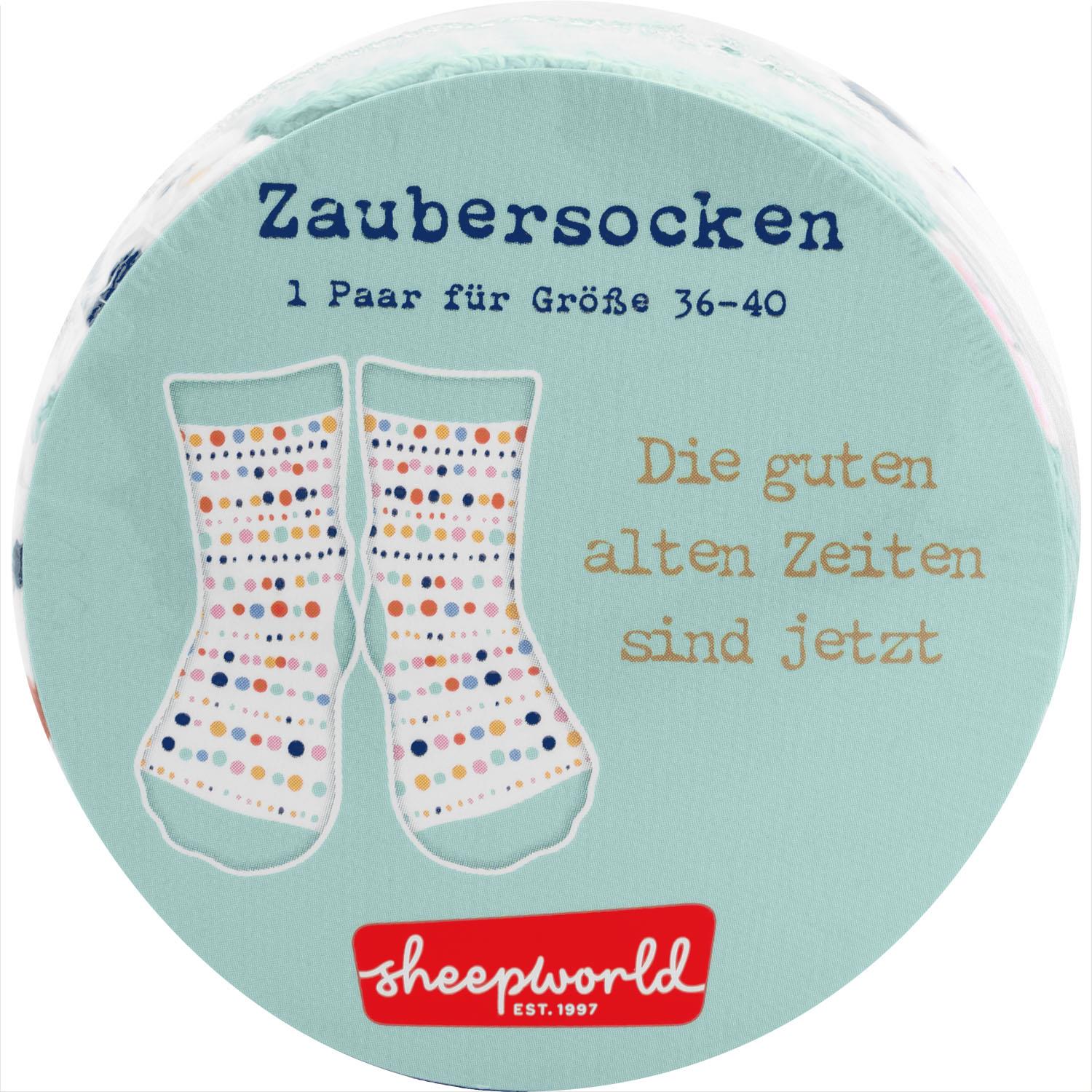 Zaubersocken mit bunten Tupfen, Größe 36–40, auf runder Verpackung