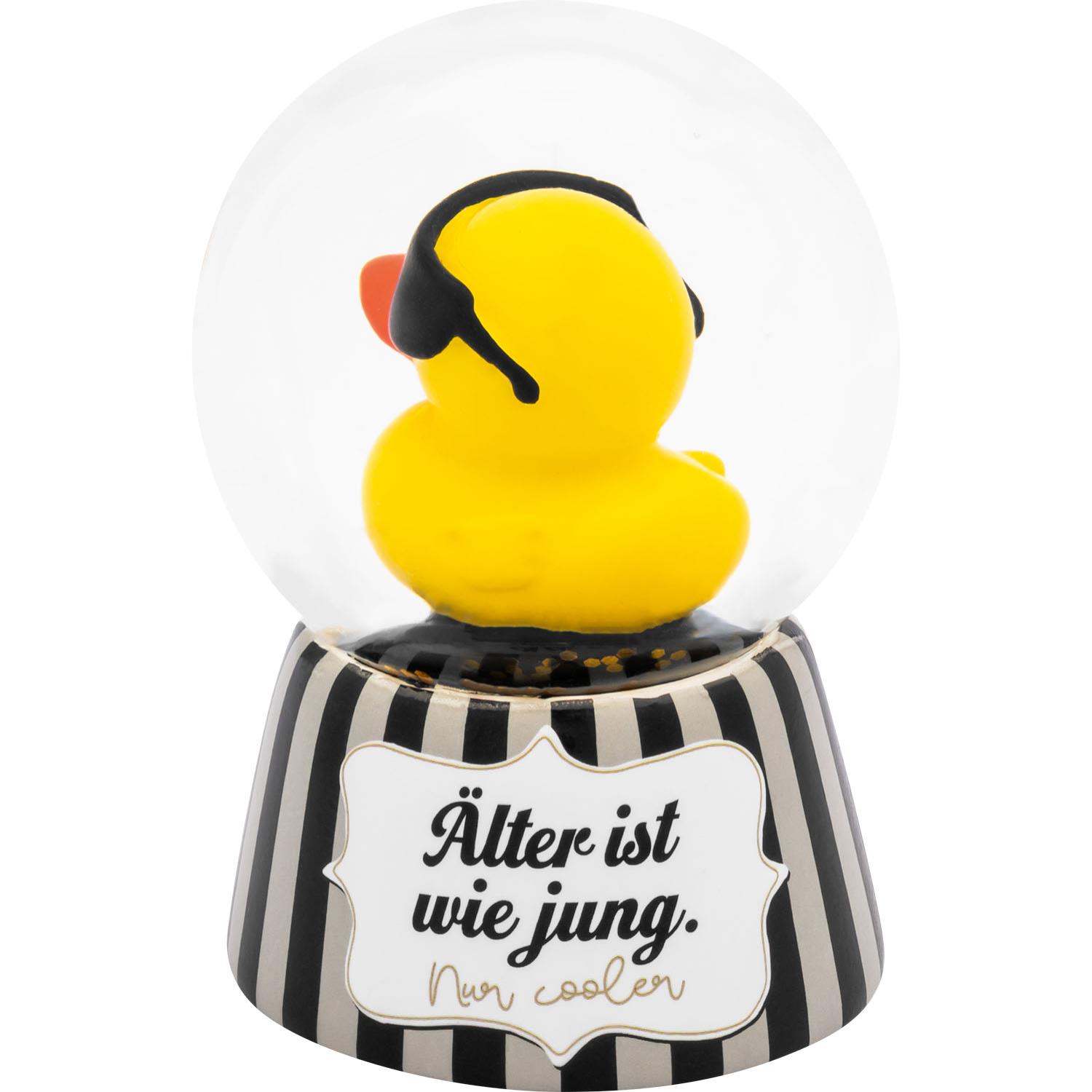Gelbe Ente in Glaskugel auf gestreiftem Sockel – Traumkugel