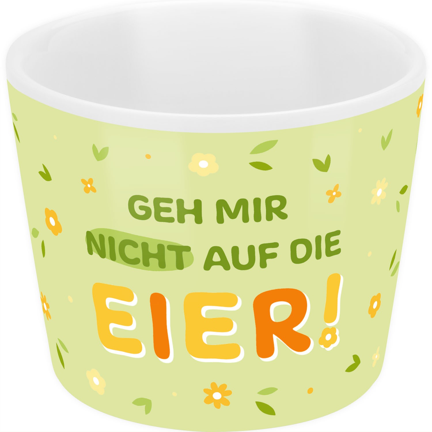 Hellgrüner Porzellaneierbecher mit floralem Muster und Spruch.