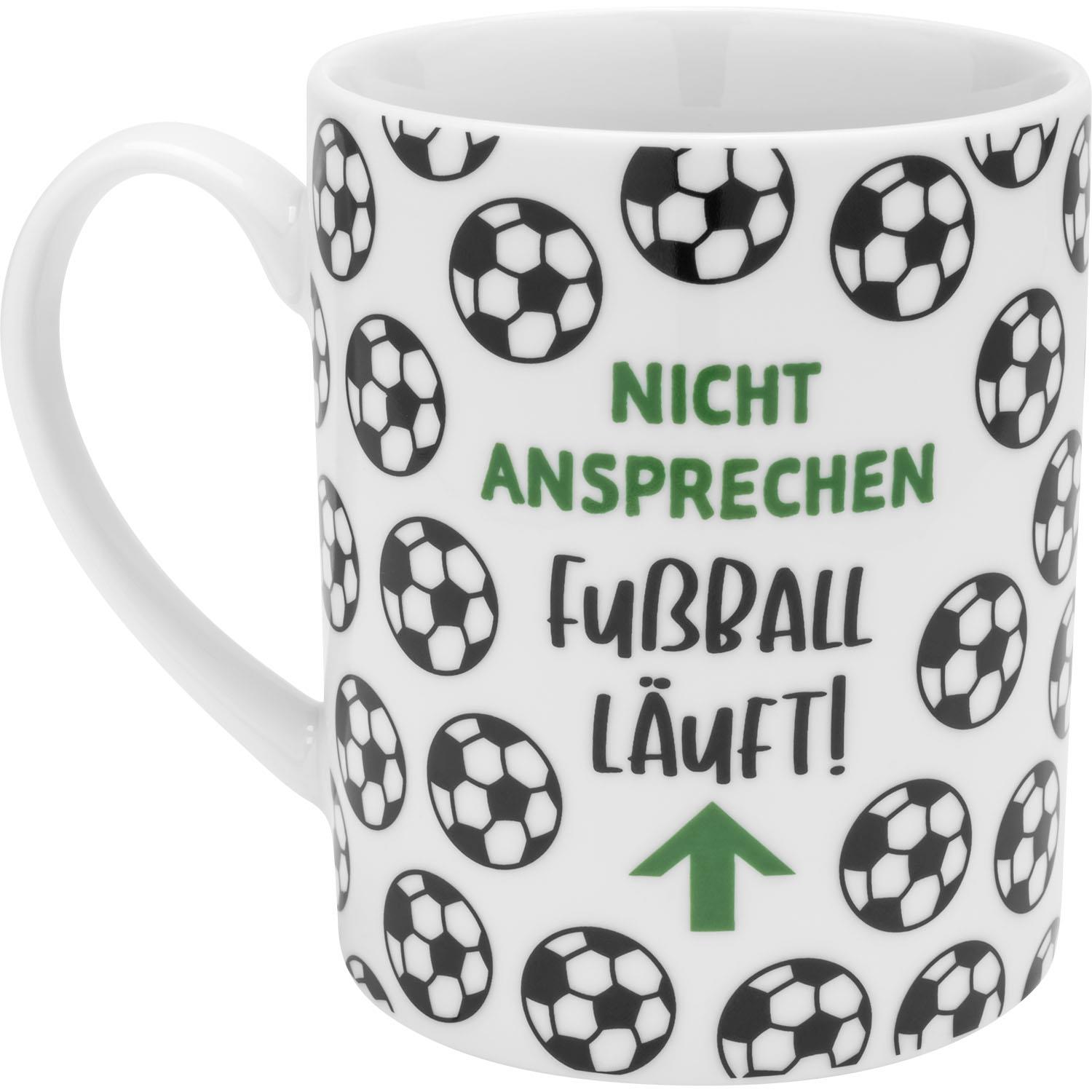 Weiße XL-Tasse mit schwarzen Fußballbällen und grüner Aufschrift NICHT ANSPRECHEN