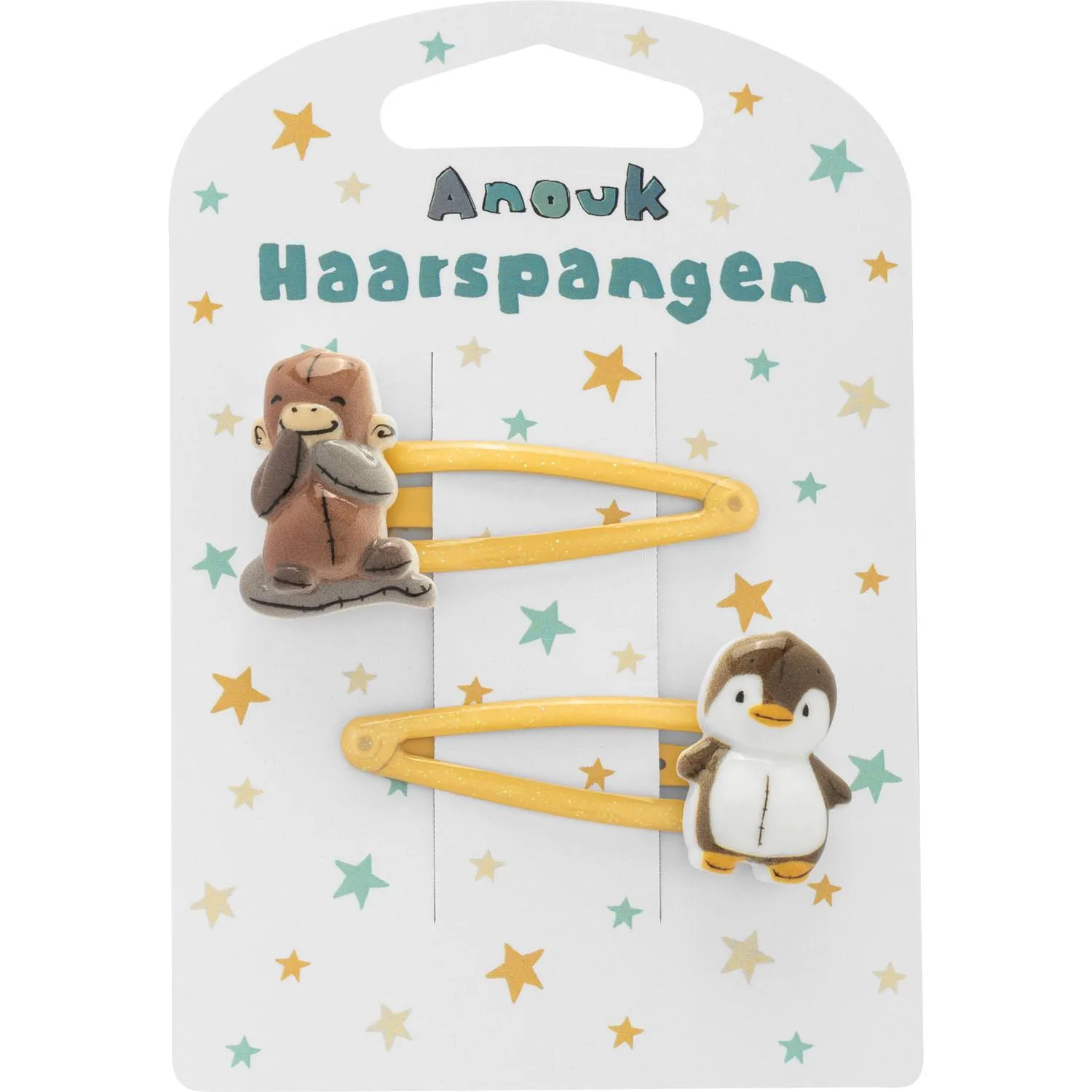 Haarspangen-Set mit Affi-Monkey und Pinguin, gelbe Spangen auf weißem Hintergrund mit Sternen