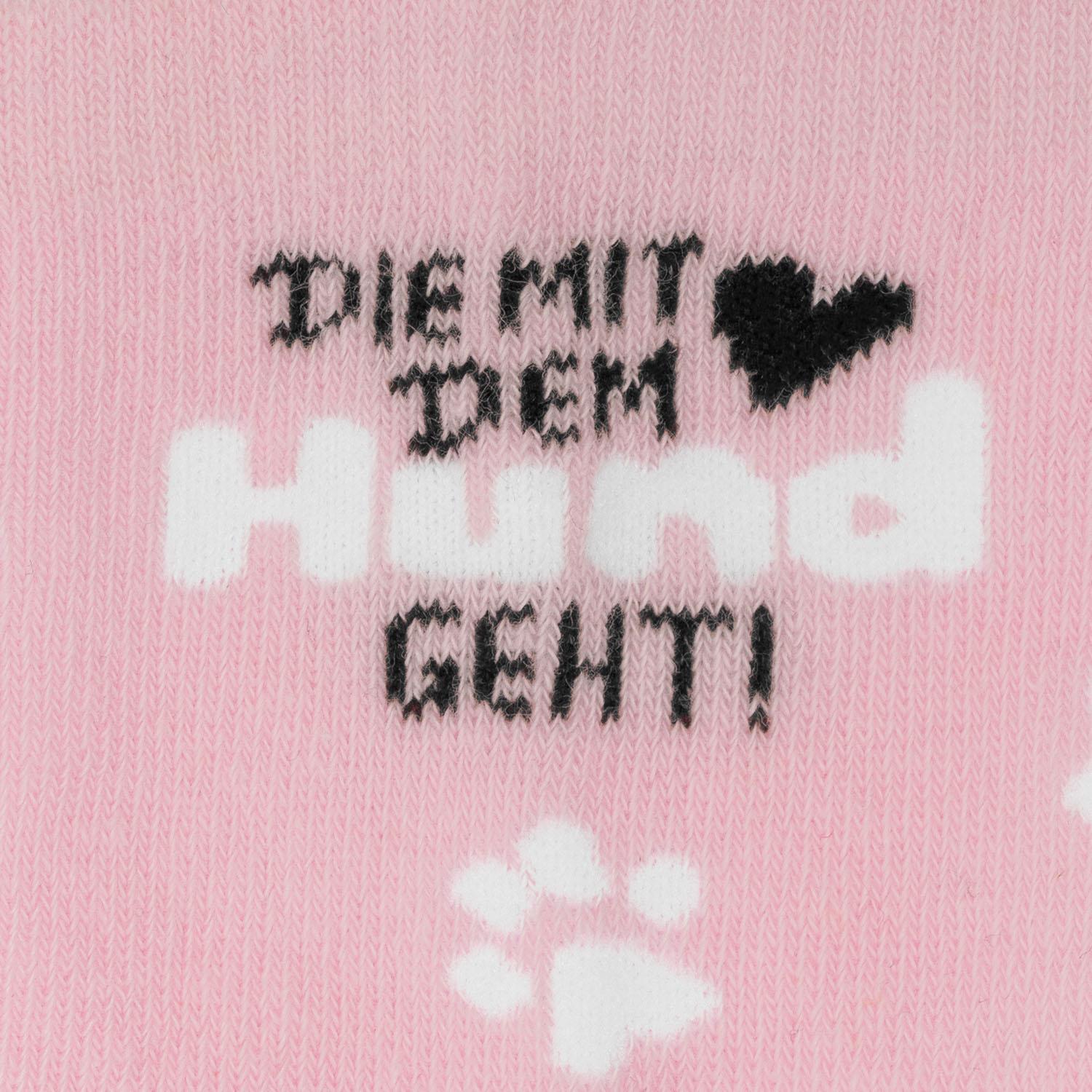 Rosa Zaubersocken mit schwarzem Text 'THE GIRL' und Herz, weiße Tupfen