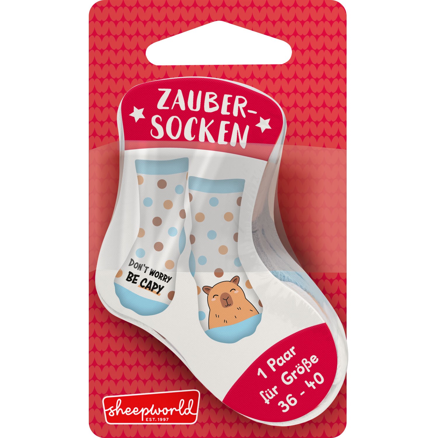 Weißer Zaubersocken mit Capybara-Motiv und Pastell-Punkte-Muster in roter Verpackung.