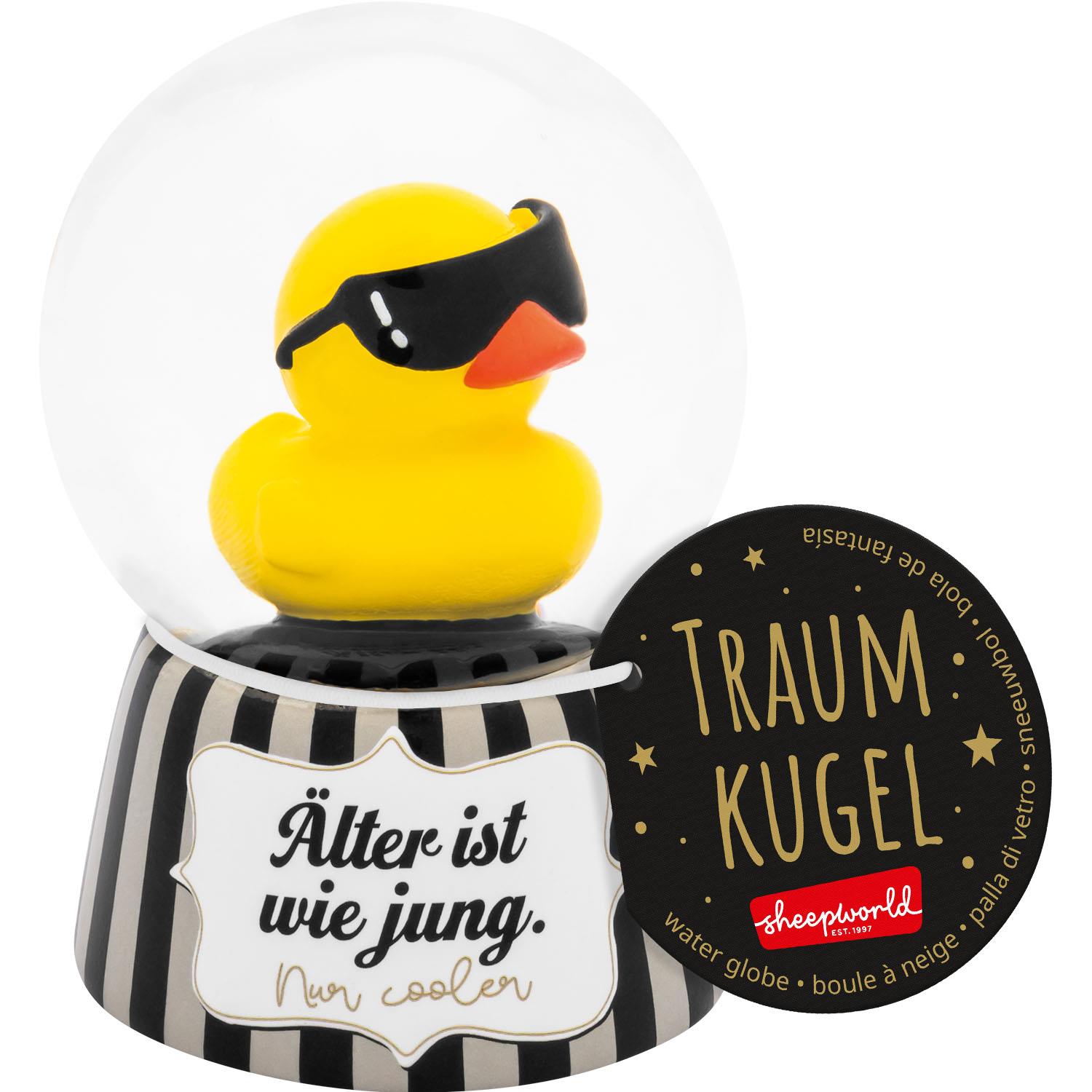 Gelbe Ente in Glaskugel mit Sonnenbrille, auf gestreiftem Sockel, Goldglitter.