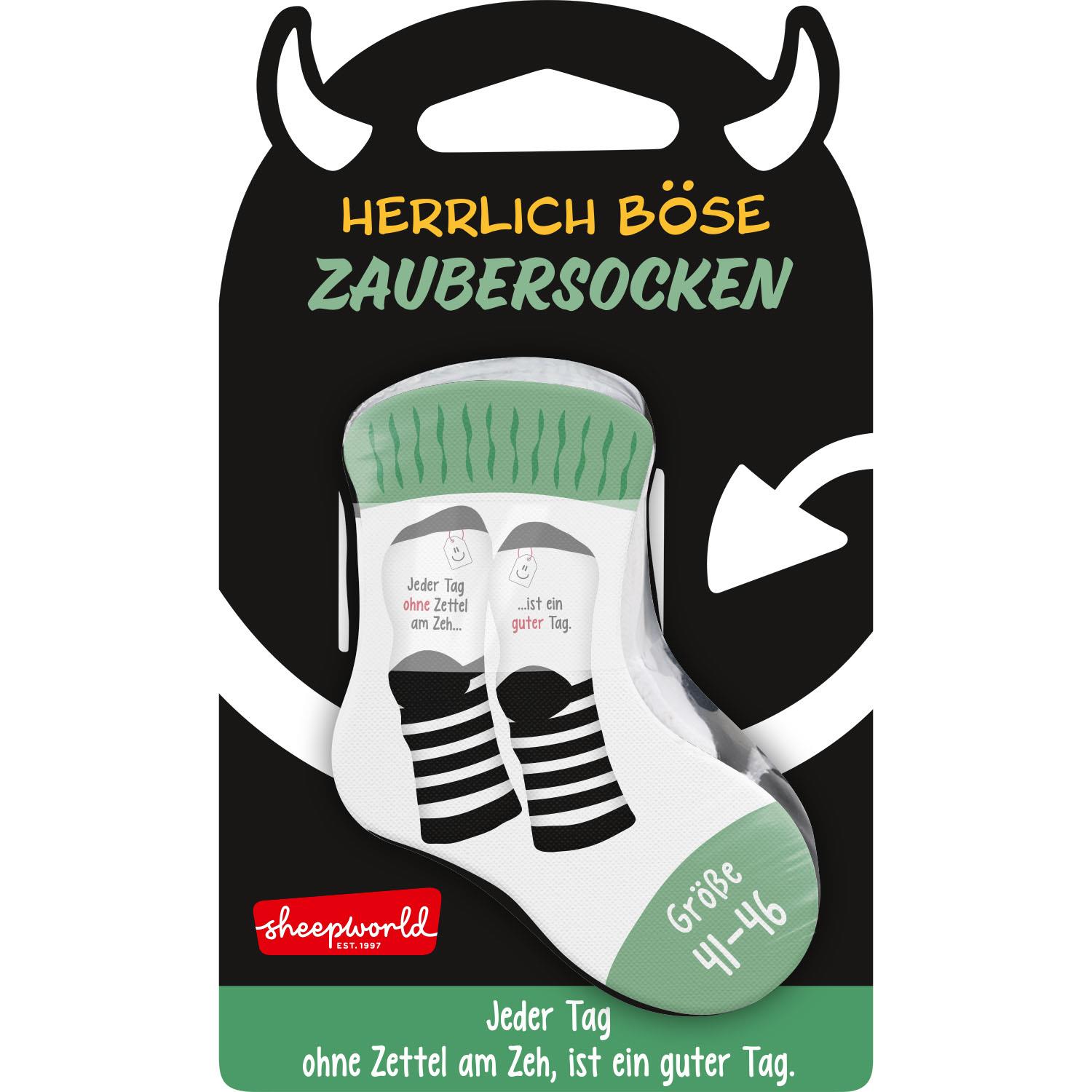 Weiße Zaubersocken mit schwarzen Streifen und Spruch auf der Verpackung.