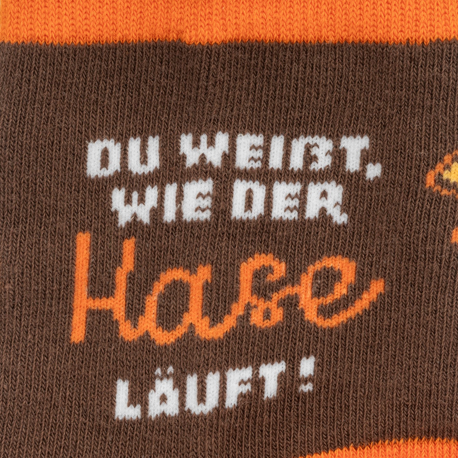 Zaubersocken »Hase« in braun/orange mit Spruch 'Du weißt, wie der Hase läuft'