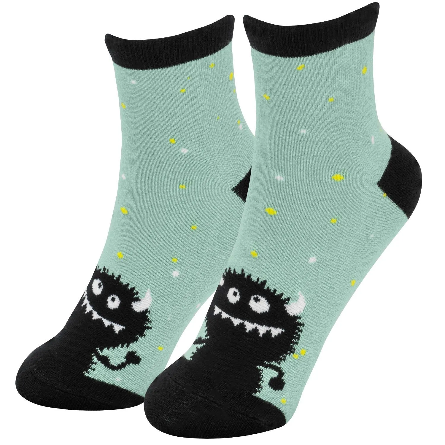 Mintgrüne Zaubersocken mit schwarzem Monster-Motiv und gelb-weißen Punkten