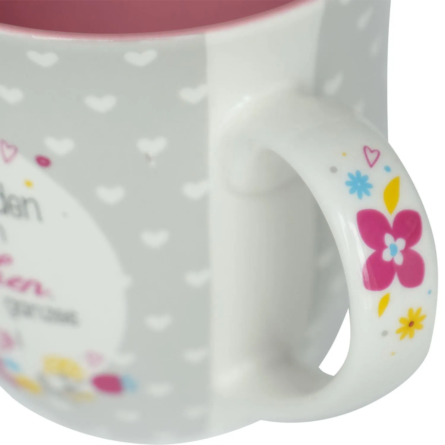 Porzellan-Tasse grau mit weißen Herzen, rosa Innendruck und farbigen Blüten am Griff