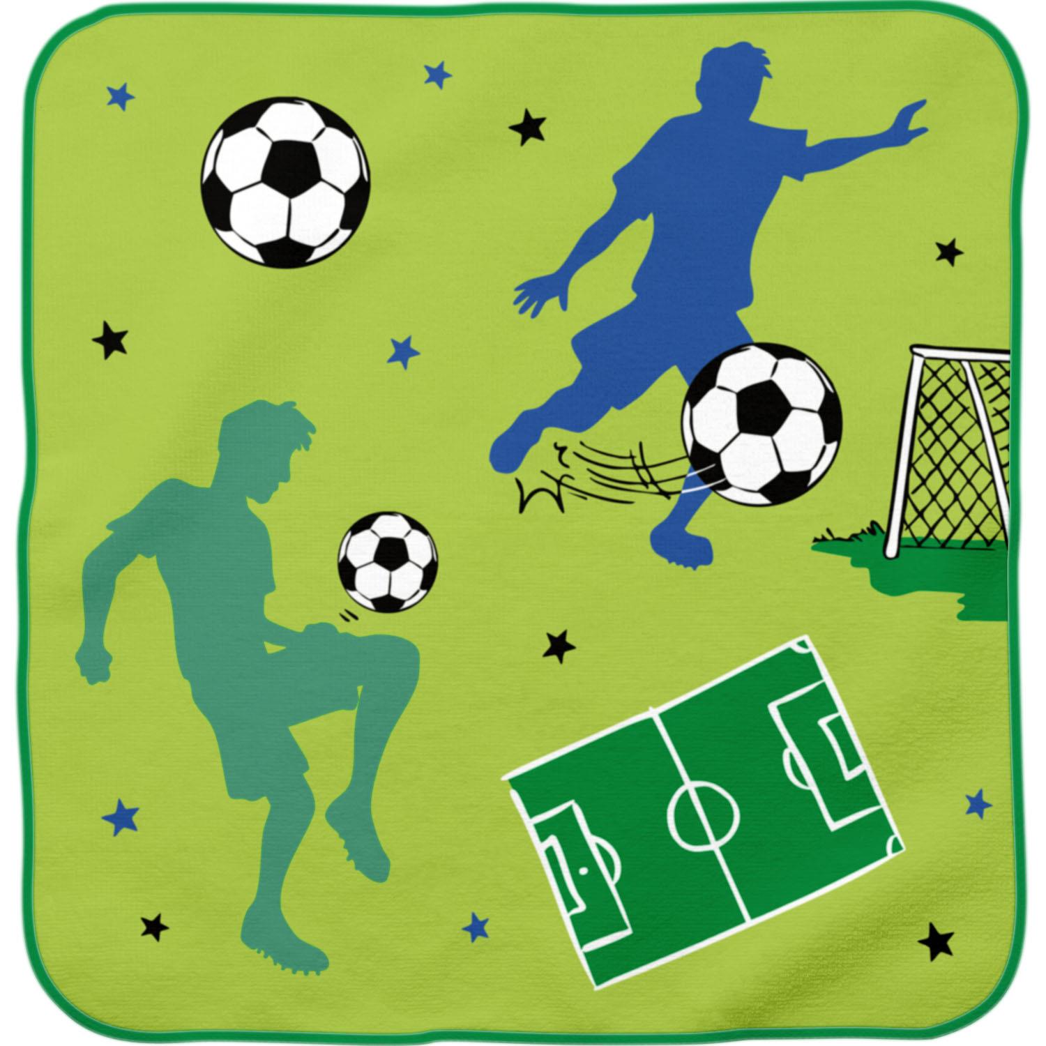 Zauberhandtuch aus Grün mit Fußball-Motiven, rund gepresst; entfaltet sich im Wasser.