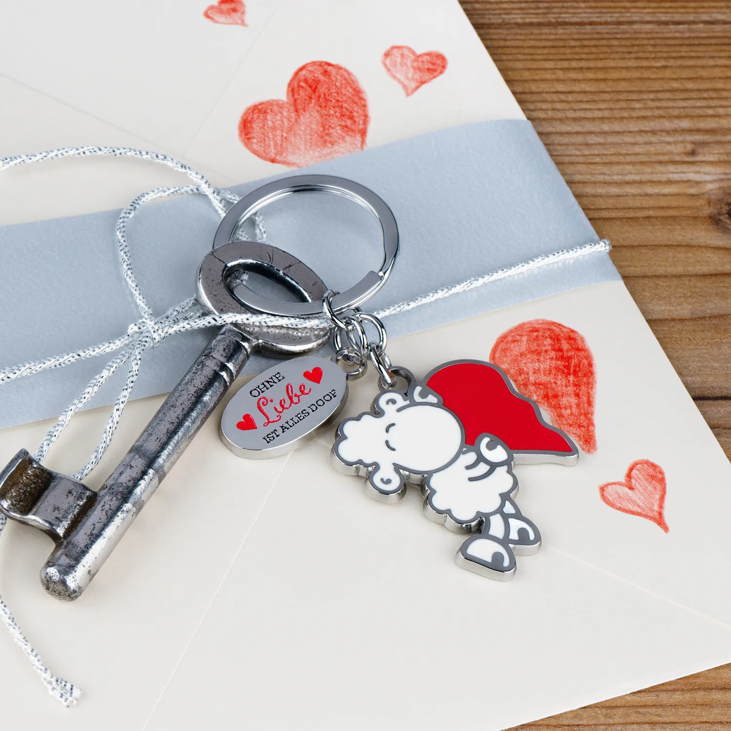 Schlüsselanhänger-Set mit weißem Schäfchen und rotem Herz – zwei Anhänger