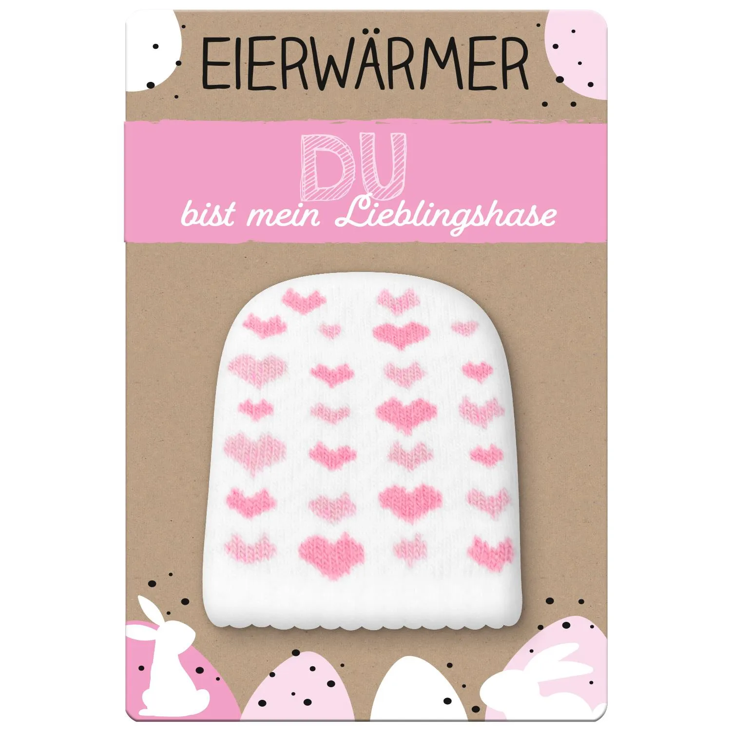 Weißer gestrickter Eierwärmer mit rosa Herz-Motiv auf brauner Verpackung
