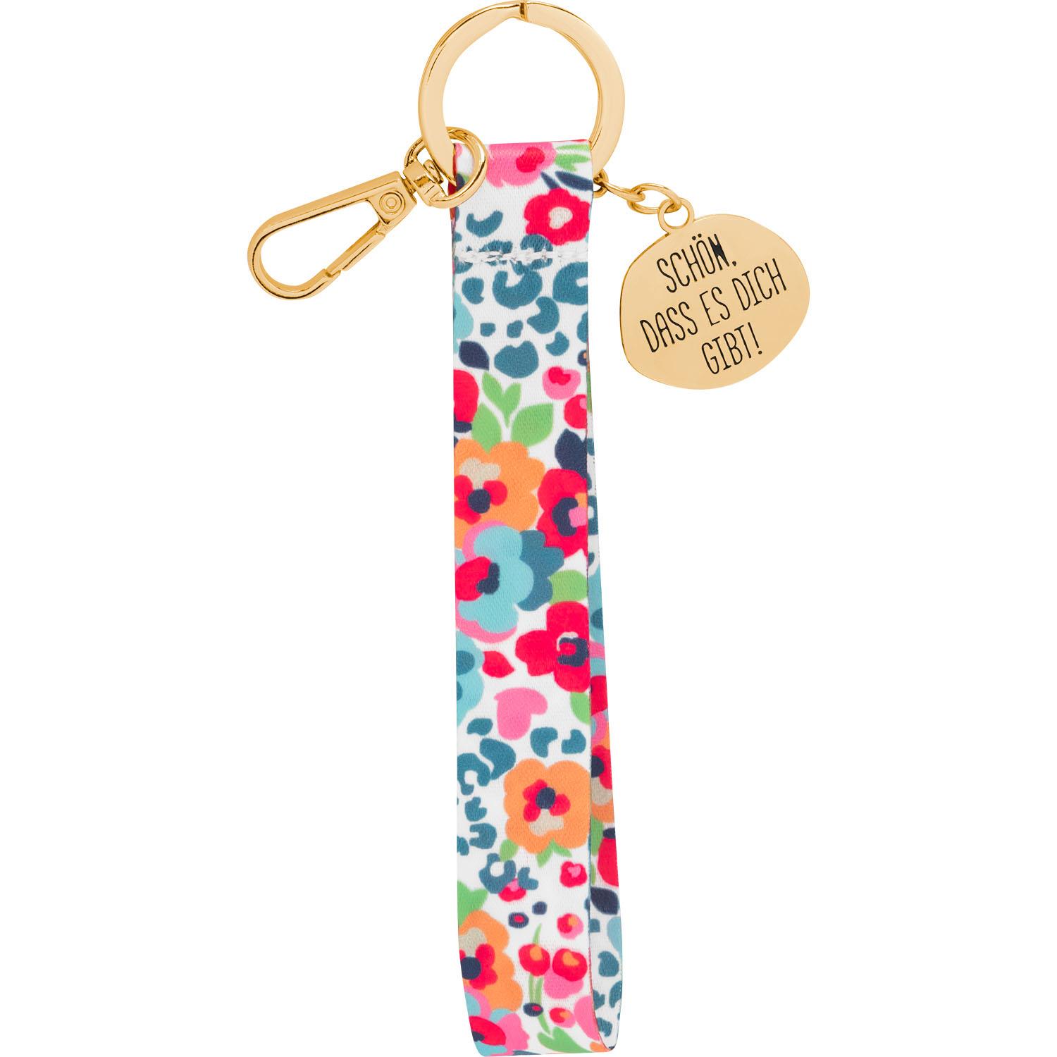 Florales Schlüsselband mit goldenem Karabiner, Schlüsselring und graviertem Anhänger.