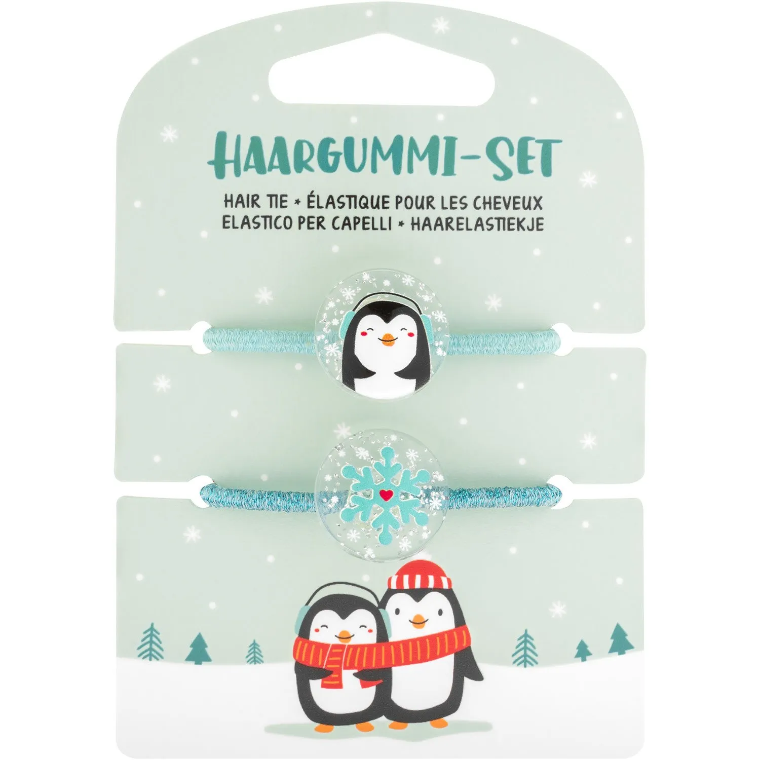 Haargummi-Set Eisbär mit zwei mint-türkisfarbenen Gummis und Pinguin-Schneeflocken-Motiven.