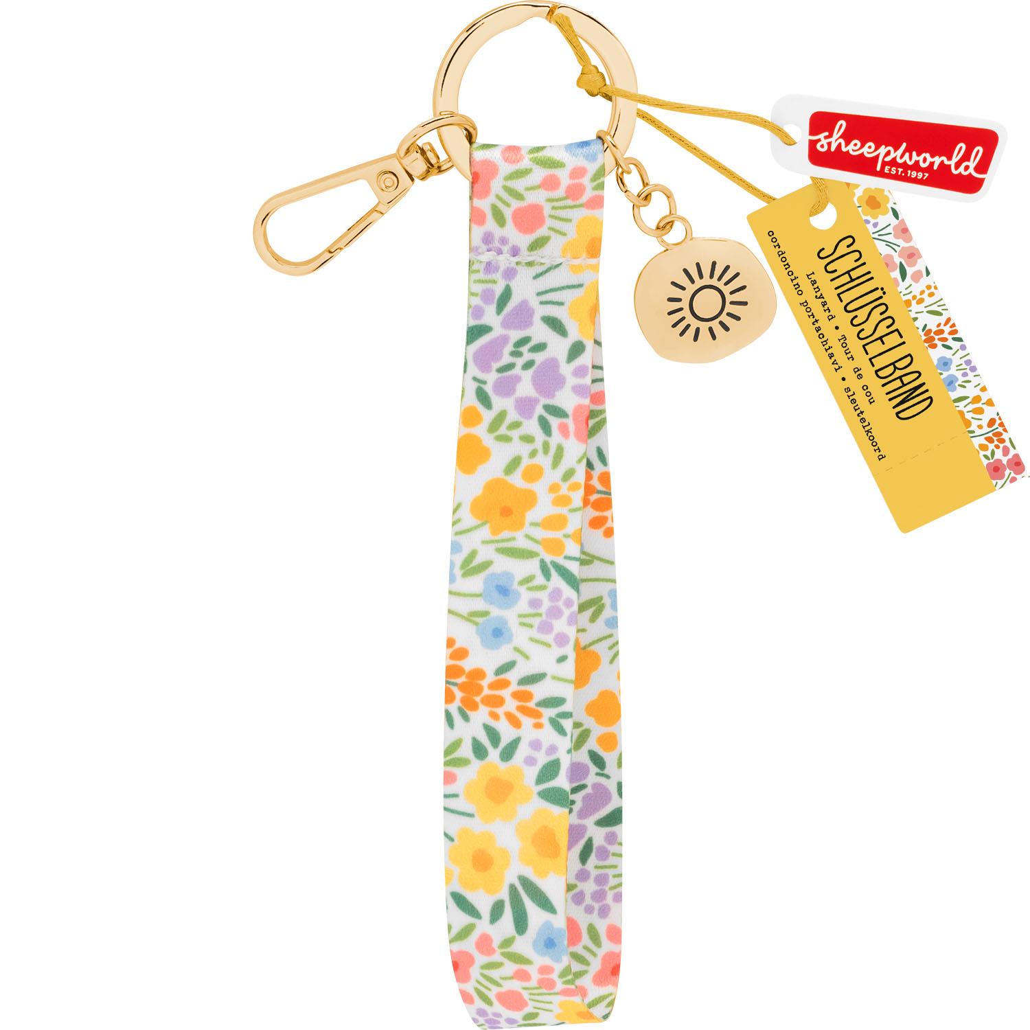 Floralfarbenes Schlüsselband mit goldenem Sonnenanhänger