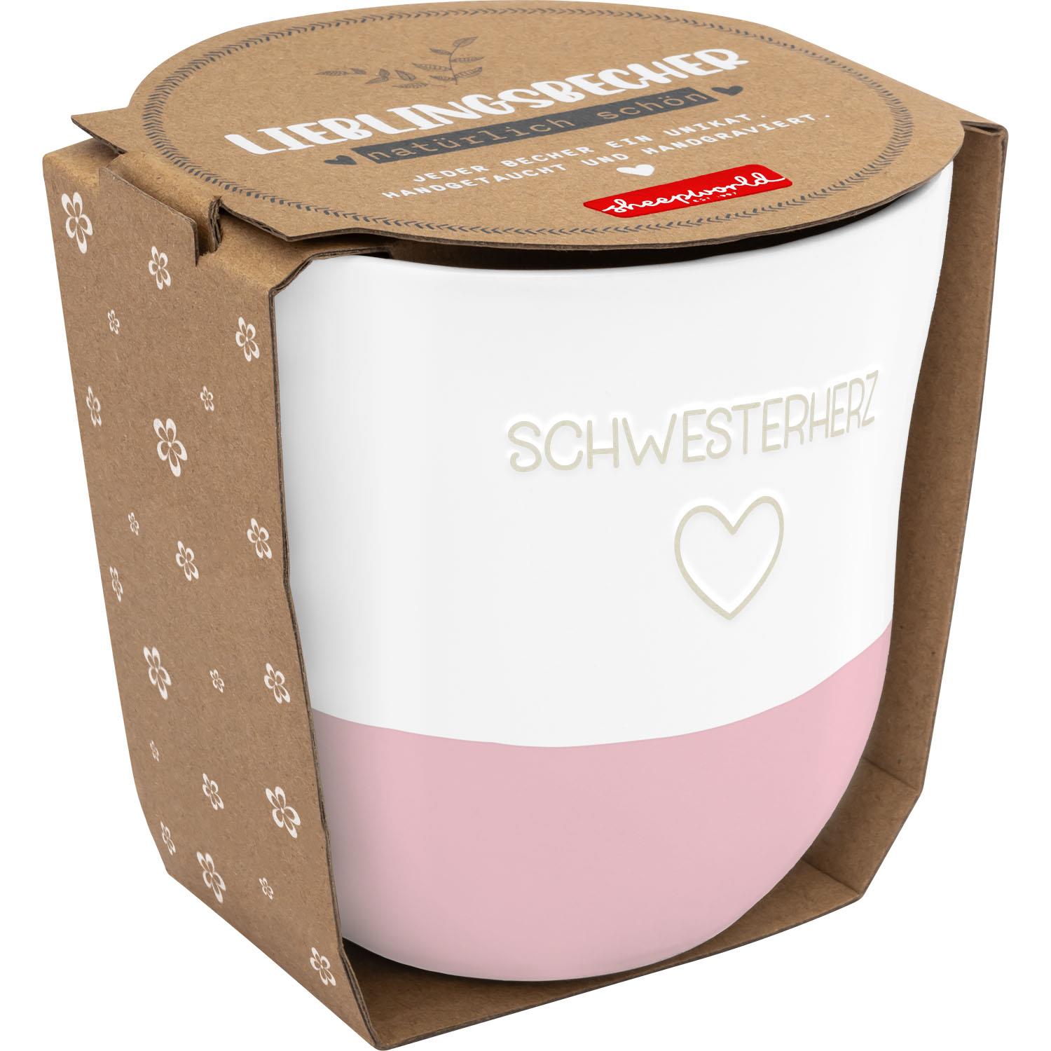 Weiße Steinzeug-Tasse mit pinkem Boden und Herz-Schriftzug SCHWESTERHERZ