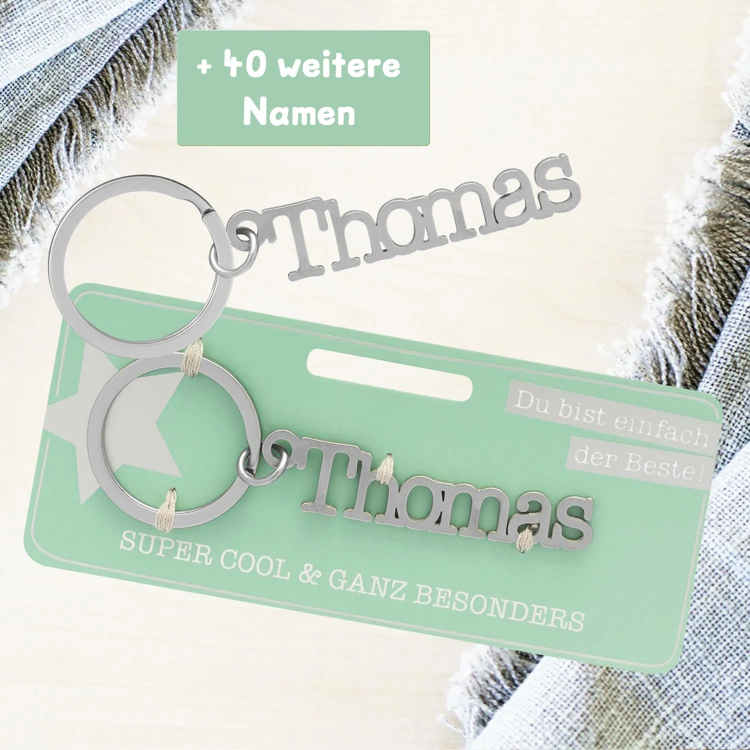 Silberner Namens-Schlüsselanhänger 'Thomas' aus Edelstahl mit Namensschrift