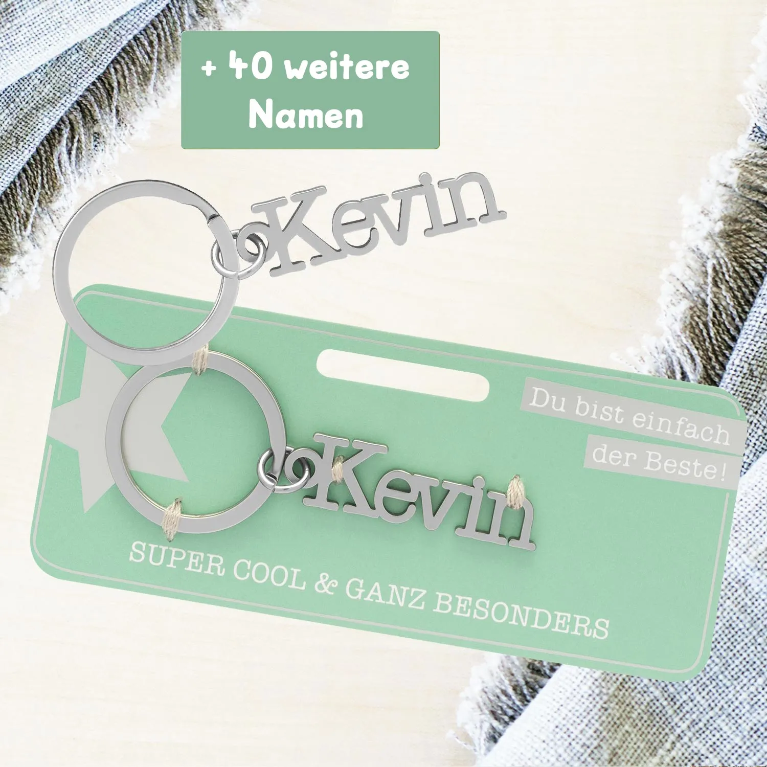 Schlüsselanhänger mit Namenszug Kevin aus Edelstahl, zwei Ringe