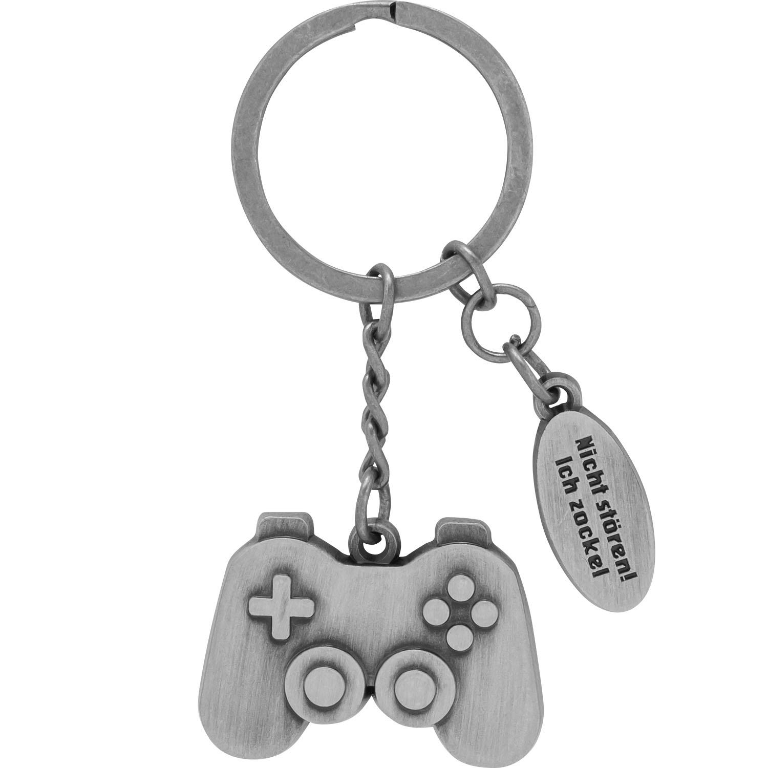 Metallischer Schlüsselanhänger in Controller-Form mit Textanhänger