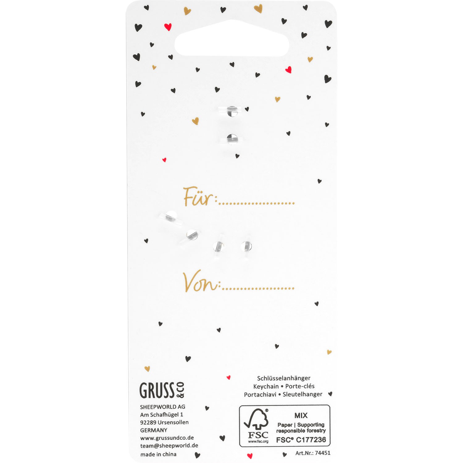 Kleiner Metall-Schlüsselanhänger mit Herz-Anhänger auf weißer Headerkarte mit Herzchen-Muster